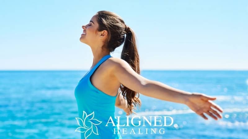 Woman Healing Chronic Pain By Stretching